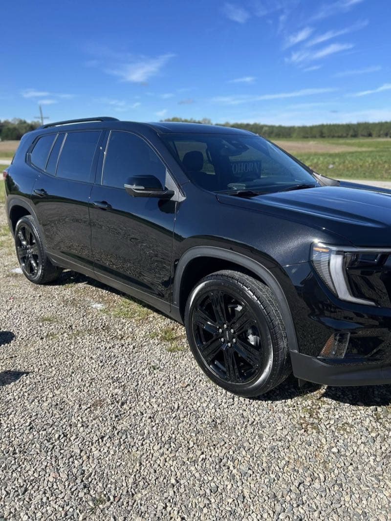 Black SUV with glossy spray ceramic coating finish